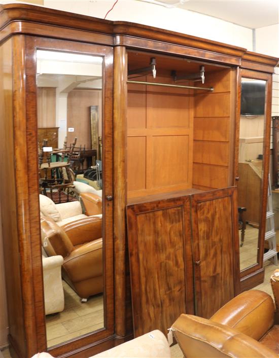 A large Victorian 'plum pudding' mahogany breakfront wardrobe, W.280cm H.241cm